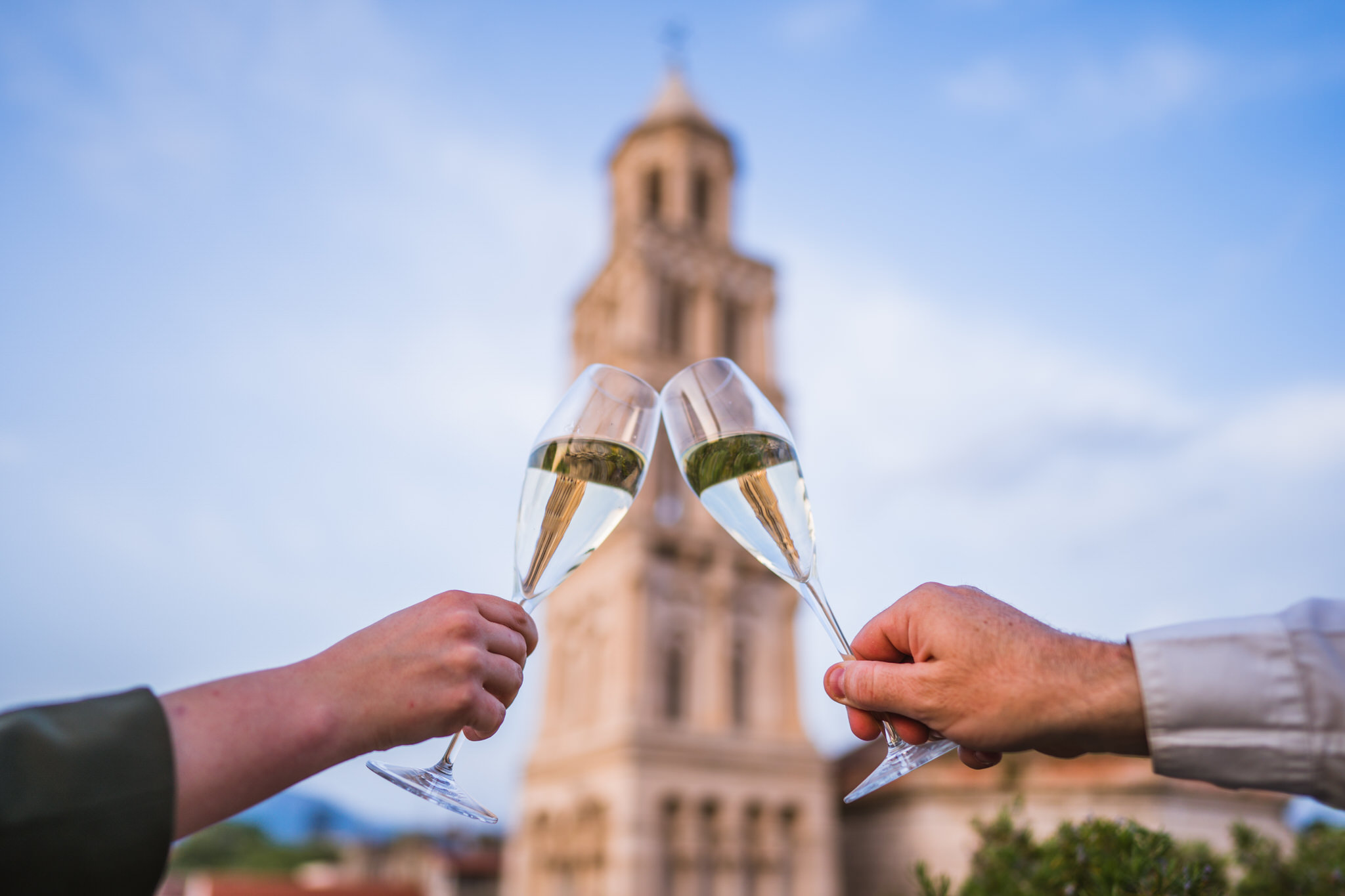 Champagne toast with a view of the Cathedral