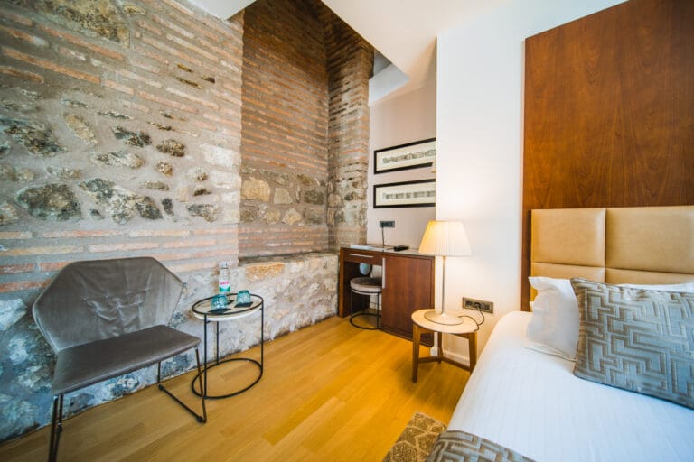 Superior double or twin room with the ancient wall in focus
