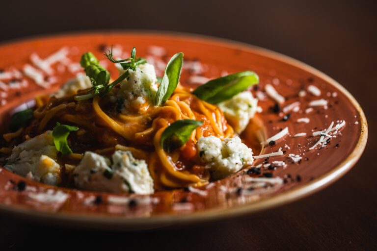 Homemade pasta with white tomato sauce